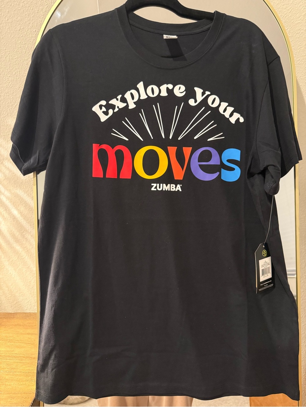 Zumba Fitness "Explore Your Moves" Short Sleeve Tee - Black with Rainbow Print